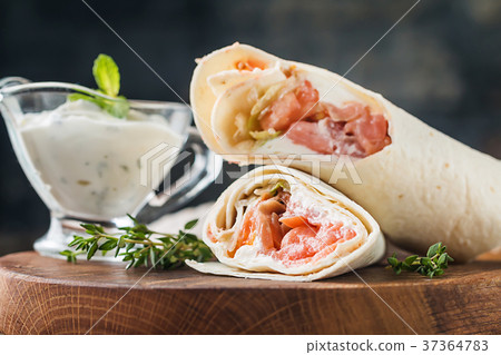 fresh tortilla wrap with salmon 37364783