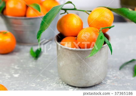 Tangerines background. Delicious and beautiful Tangerines background. Delicious and beautiful 37365186