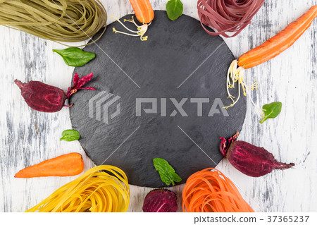 Colored Raw Vegetable Vegetarian Pasta. 37365237