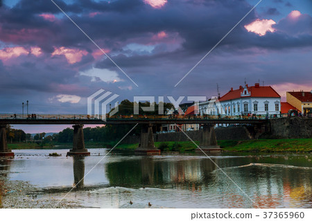 Evening pedestrian bridge the center of Uzhgorod Evening pedestrian bridge the center of Uzhgorod 37365960