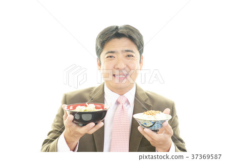 A man who enjoys meals A man who enjoys meals 37369587