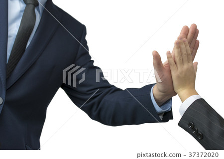 father and son in formal wear giving high five on father and son in formal wear giving high five on 37372020