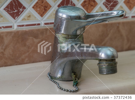 Tap water with lime scales Calcified 37372436