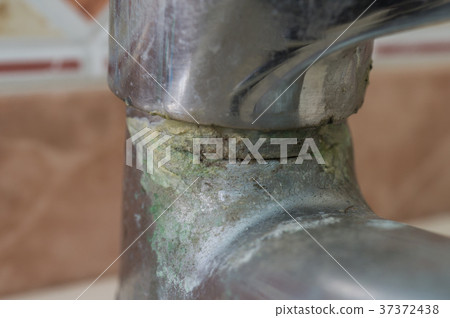 Tap water detail with lime scales Calcified 37372438