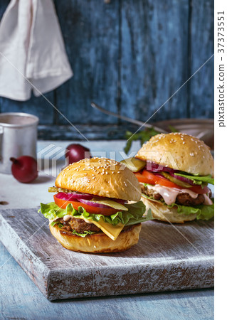 Two homemade hamburgers Two homemade hamburgers 37373551