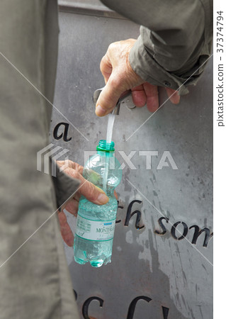 Faucet in the sanctuary of Lourdes, France 37374794