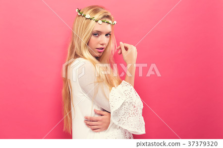 Beautiful young woman with a garland Beautiful young woman with a garland 37379320