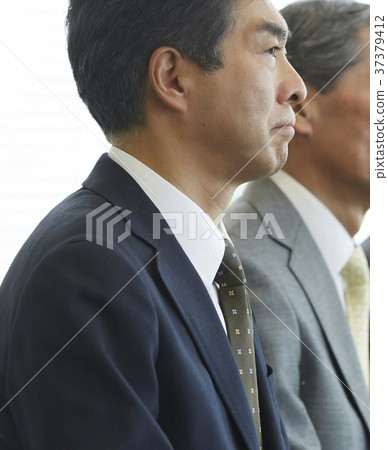 Senior man receiving an interview Senior man receiving an interview 37379412