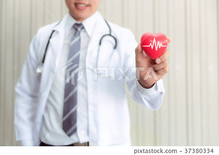 Senior doctor wearing stethoscope Senior doctor wearing stethoscope 37380334