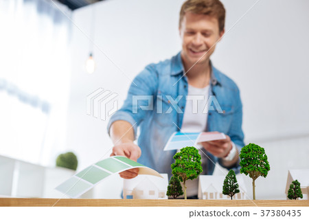 Satisfied engineer fining the best color for a Satisfied engineer fining the best color for a 37380435