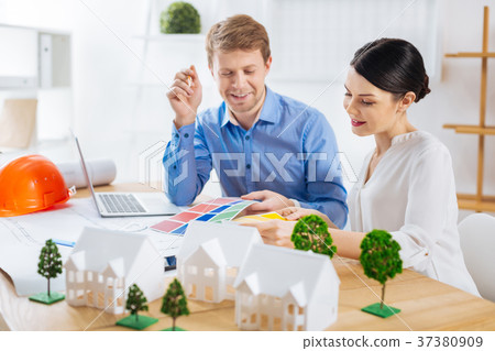 Clever colleagues feeling interested while 37380909