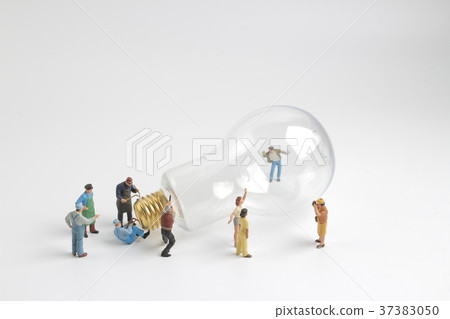 group of figure working on a bulb group of figure working on a bulb 37383050