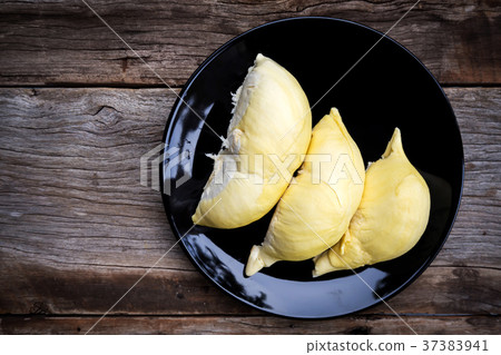 Durian on Black plate. Top view. Tropical fruit. 37383941