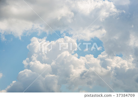 Clouds against a blue sky Clouds against a blue sky 37384709