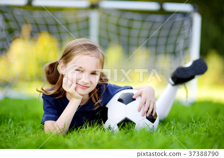 Cute little soccer player Cute little soccer player 37388790