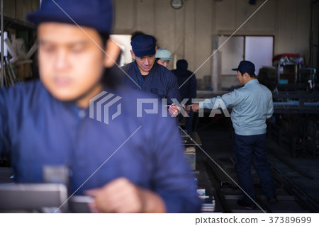 Town factory workers Town factory workers 37389699