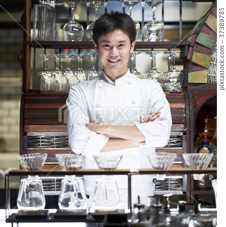 Chef standing in a restaurant Chef standing in a restaurant 37389785