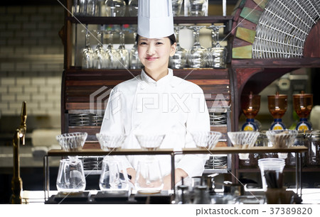 Chef standing in a restaurant 37389820