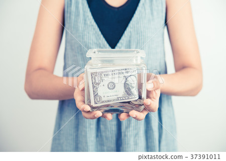 hands holding piggy bank show money dollar bill hands holding piggy bank show money dollar bill 37391011
