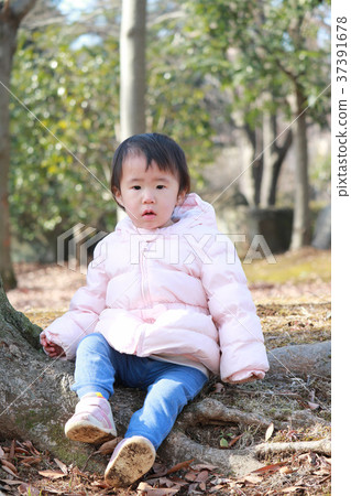 Winter outside play 1 year old girl 37391678