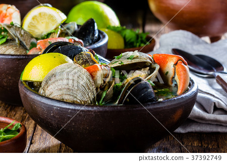 Seafood clams crabs mussela soup. Mariscal Seafood clams crabs mussela soup. Mariscal 37392749
