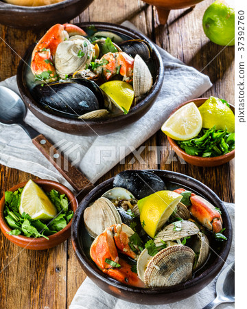 Seafood clams crabs mussela soup. Mariscal Seafood clams crabs mussela soup. Mariscal 37392760