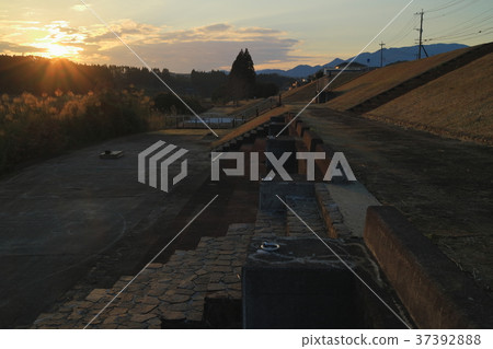 Kawauchi River in the dusk seen from the riverbed near the Kamiko Bridge Kawauchi River in the dusk seen from the riverbed near the Kamiko Bridge 37392888
