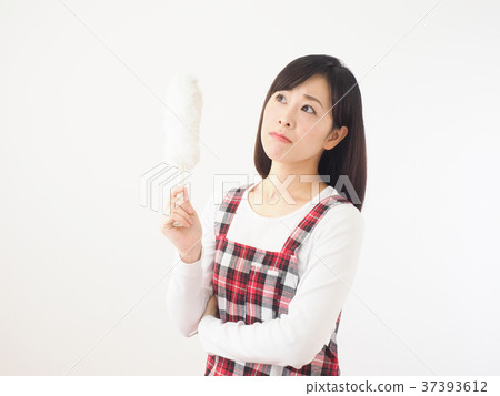 Troubled woman holding mop 37393612