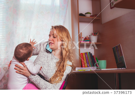 Freelance worked mom with baby 37396173