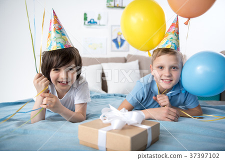 Happy young boys with air balloons Happy young boys with air balloons 37397102