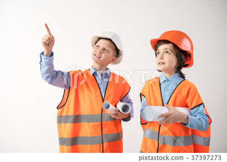 Attentive little workers talking about project Attentive little workers talking about project 37397273
