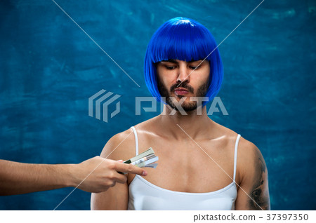 Cross dressing person posing with stack of money Cross dressing person posing with stack of money 37397350