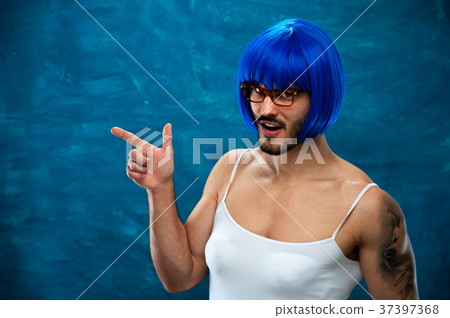 Transsexual person wearing blue wig and glasses Transsexual person wearing blue wig and glasses 37397368