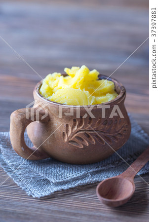 Bowl of ghee clarified butter 37397881
