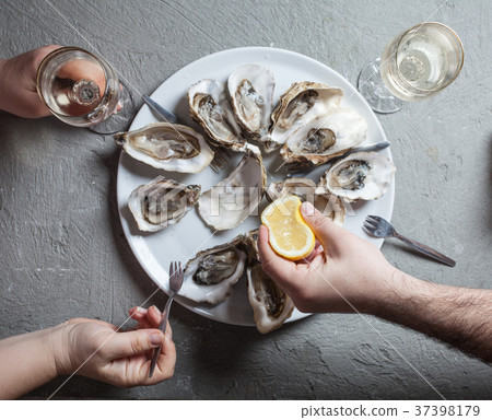 Exotic dish - oysters with wine 37398179
