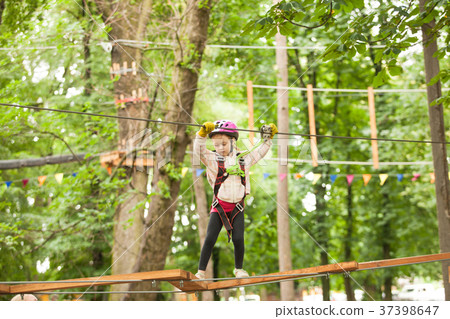 Child in a adventure playground Child in a adventure playground 37398647