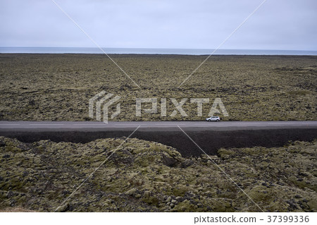 Icelandic landscape with country roadway Icelandic landscape with country roadway 37399336
