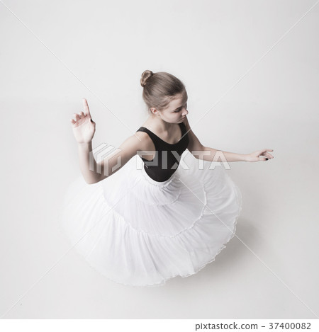 The top view of the teen ballerina on white 37400082