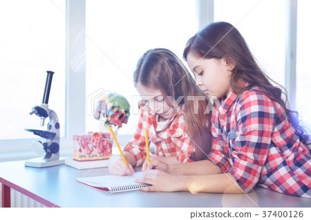 Diligent quick witted students writing the test Diligent quick witted students writing the test 37400126