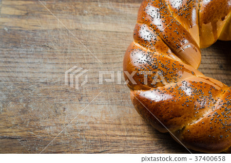 Traditional sweet wicker homemade bread. Traditional sweet wicker homemade bread. 37400658