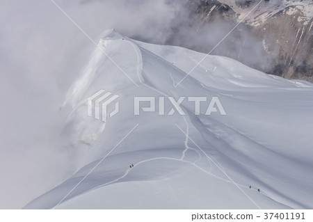 Climbers on the Mont Blanc massif, France Climbers on the Mont Blanc massif, France 37401191