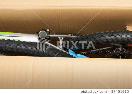Bike in paper box, photo from unboxing bike. Bike in paper box, photo from unboxing bike. 37401910