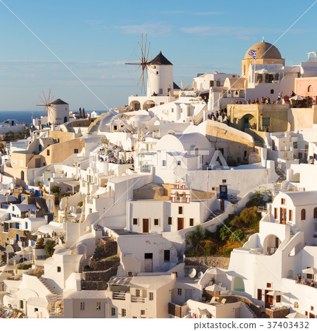 Oia village at sunset, Santorini island, Greece. 37403432