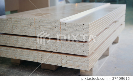 Stack of wood particleboard panels on the Stack of wood particleboard panels on the 37409615