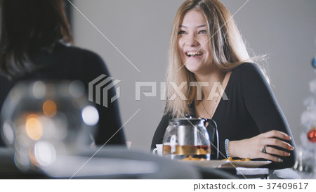 Portrait of pretty blonde young woman in cafe Portrait of pretty blonde young woman in cafe 37409617