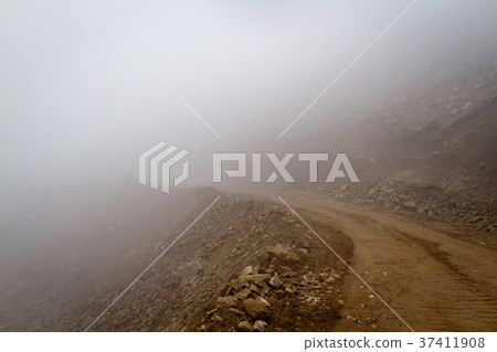 Mountain road in the fog 37411908