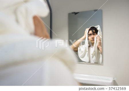 Men wiping with a towel Men wiping with a towel 37412569