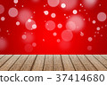 Wood table with red color background with bokeh. 37414680