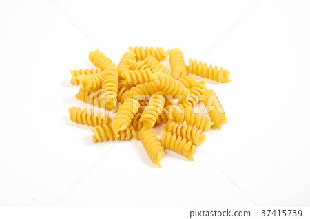 uncooked fusilli pasta noodles isolated on white uncooked fusilli pasta noodles isolated on white 37415739