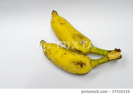 Two bananas ripened on a white background. Two bananas ripened on a white background. 37416338